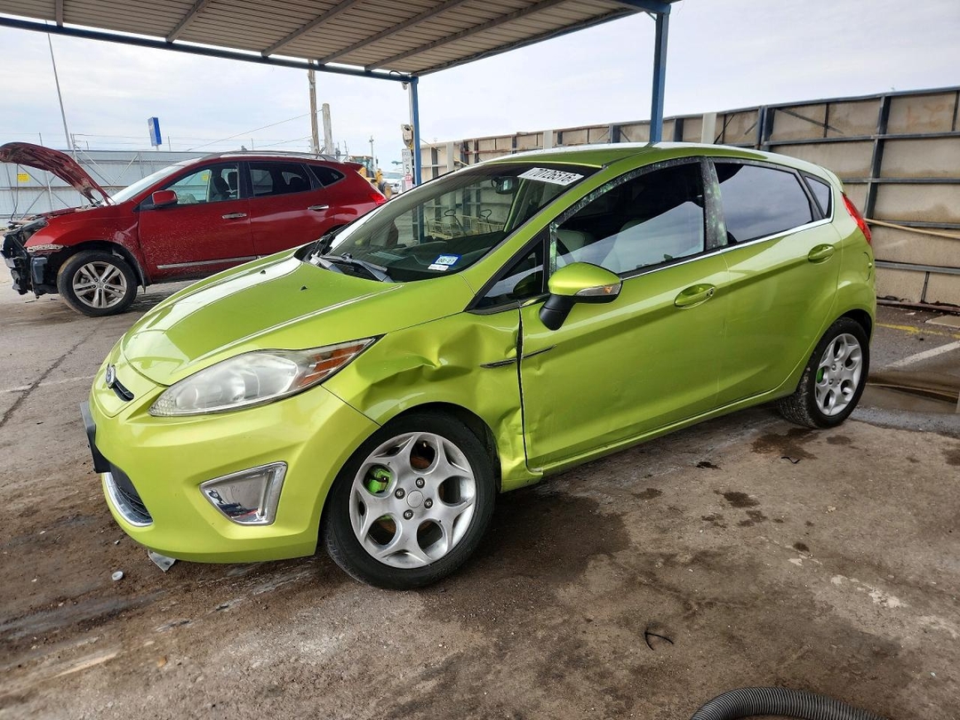 Vista de 2011 FORD FIESTA SES, ángulo 1