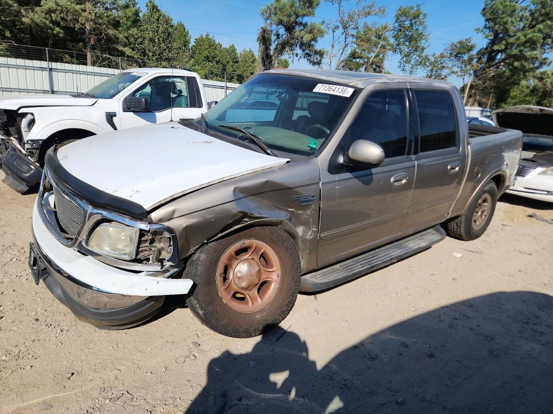 Vista de 2002 FORD F150 SUPERCREW, ángulo 1