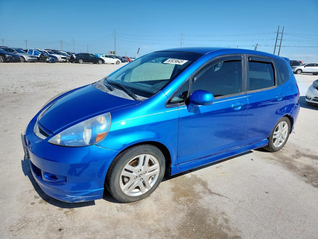 Вид 2007 HONDA FIT S, угол 1