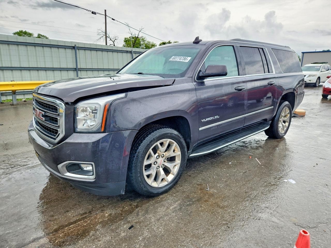 Вид 2017 GMC YUKON XL K1500 SLT, угол 1