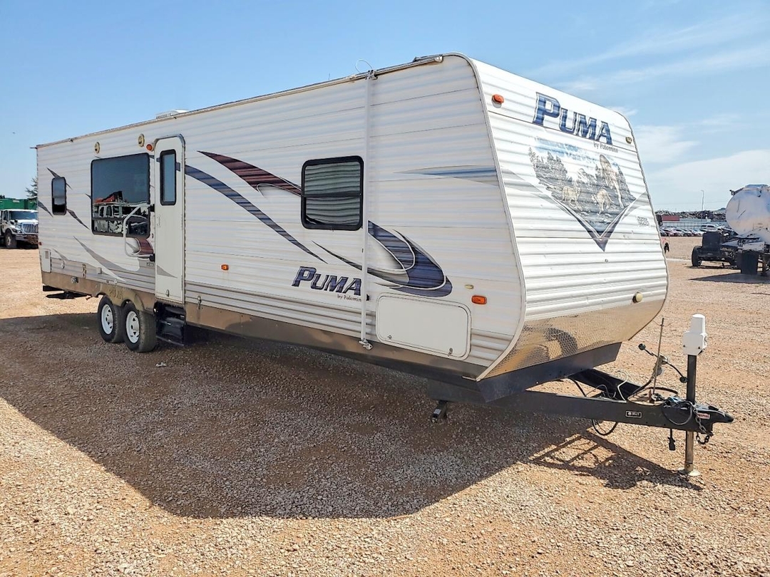 Vue de 2011 FOREST RIVER PUMA CAMPER, angle 1