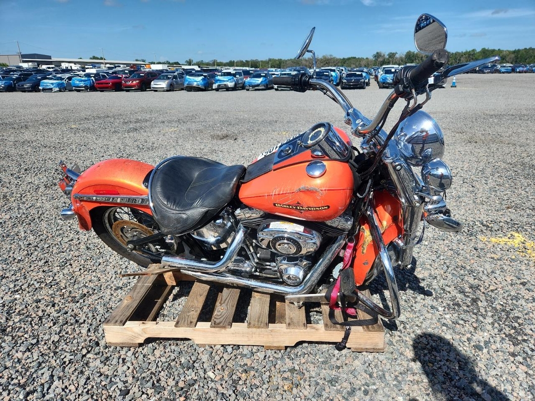 Vue de 2012 HARLEY-DAVIDSON FLSTN SOFTAIL DELUXE, angle 1