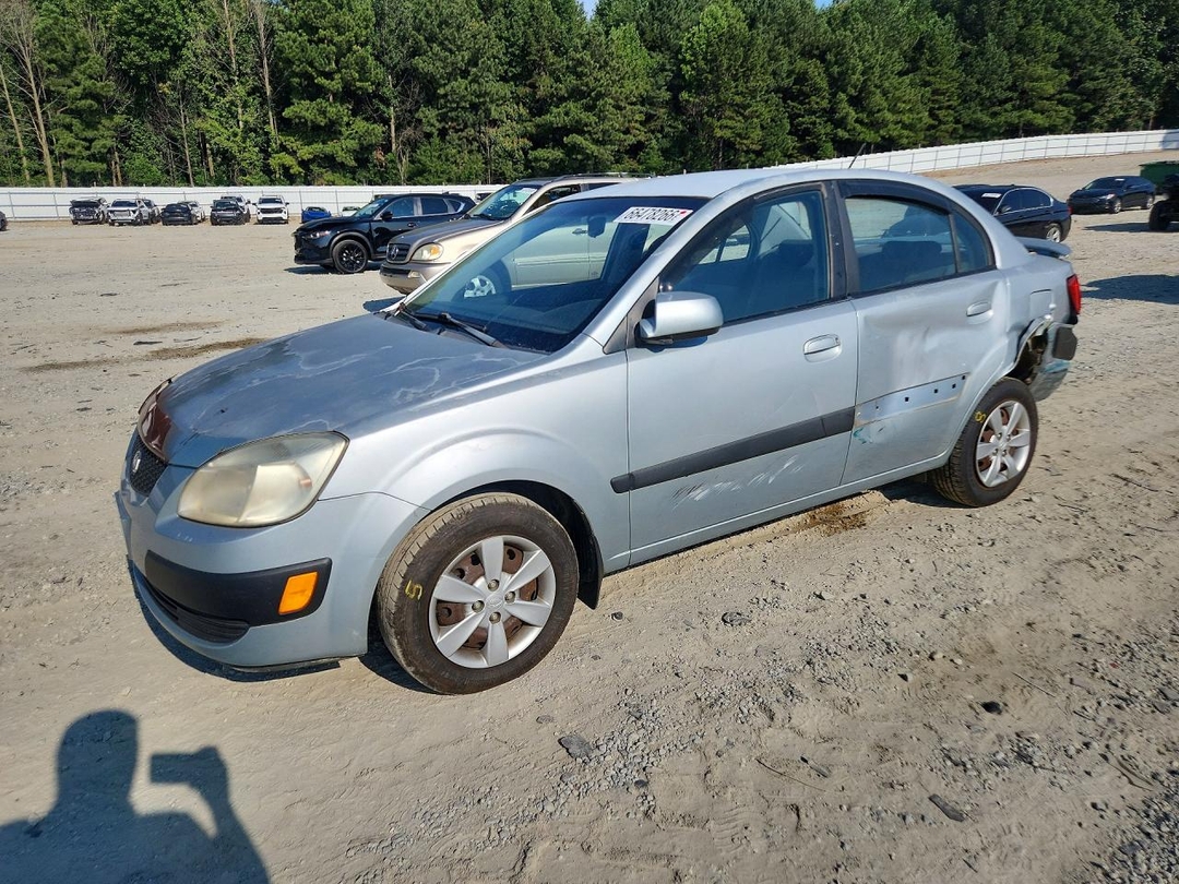 Вид 2009 KIA RIO BASE, угол 1