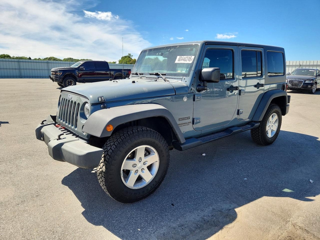 Вид 2014 JEEP WRANGLER UNLIMITED SPORT, угол 1