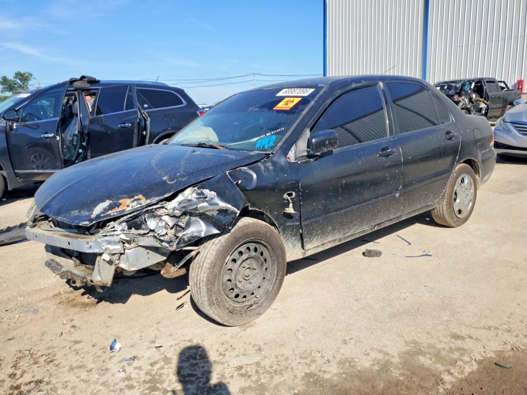 Vue de 2006 MITSUBISHI LANCER ES, angle 1