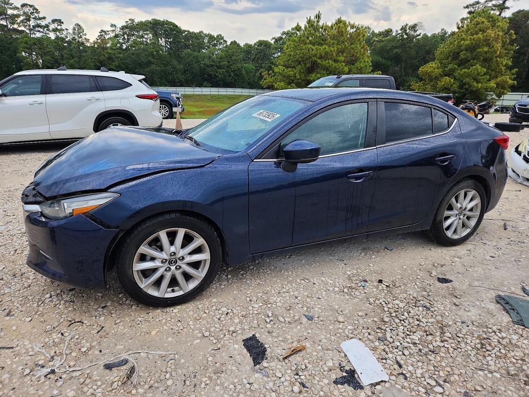 Vue de 2017 MAZDA 3 TOURING, angle 1