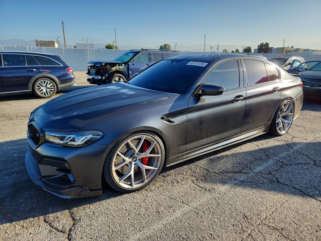 Vedere 2023 BMW M5, unghi 1