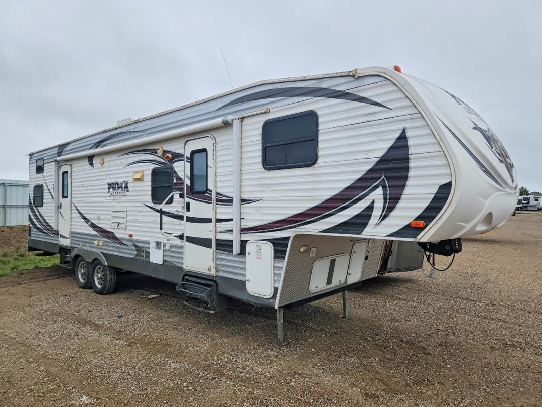 منظر 2013 FOREST RIVER PUMA CAMPER، زاوية 1
