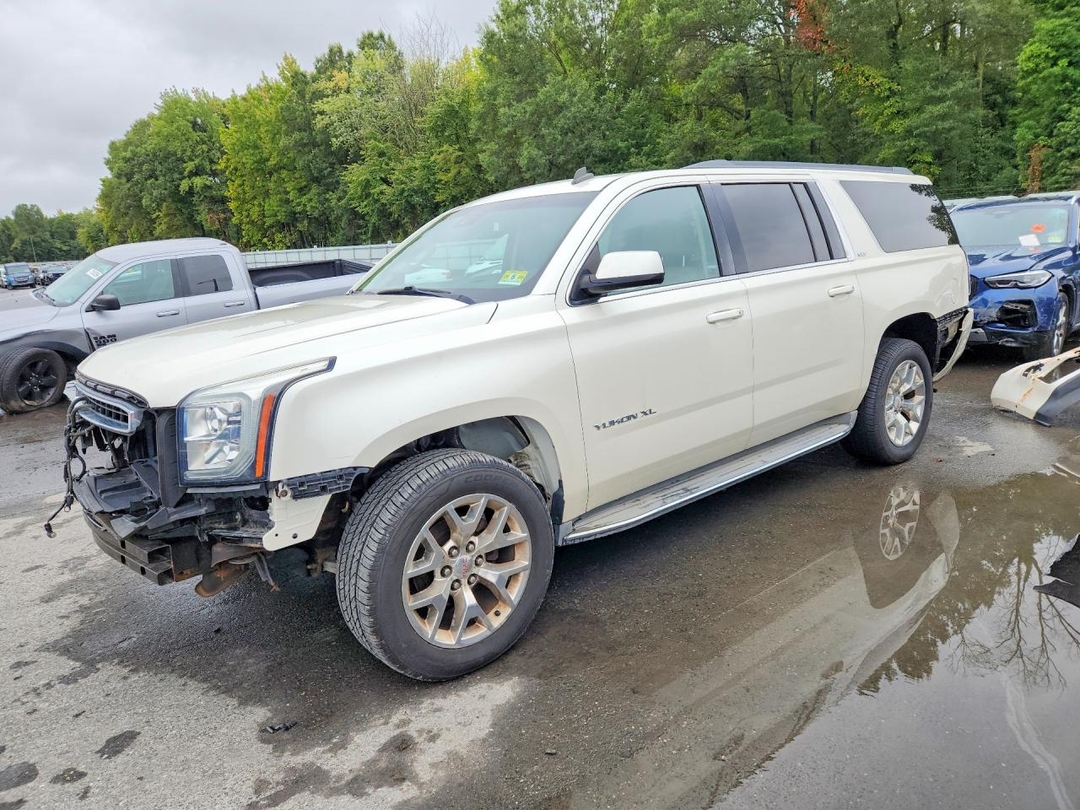 منظر 2015 GMC YUKON XL K1500 SLT، زاوية 1