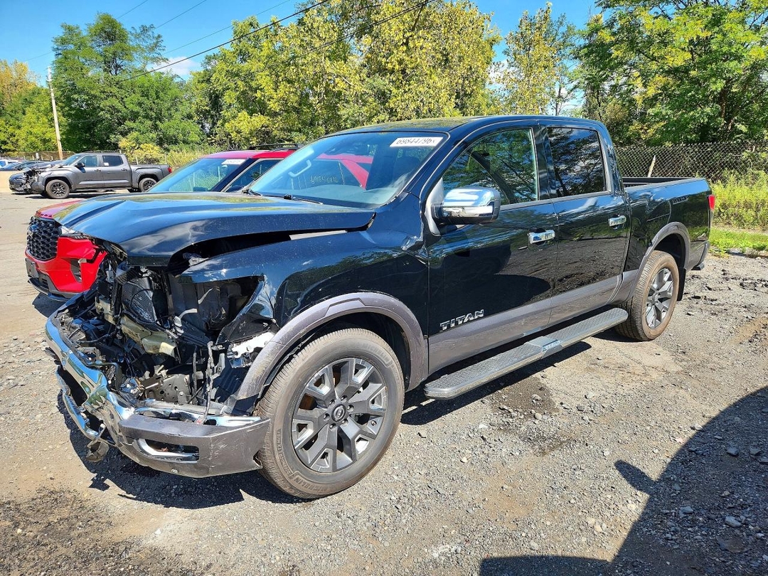 Вид 2024 NISSAN TITAN PLATINUM RESERVE, угол 1