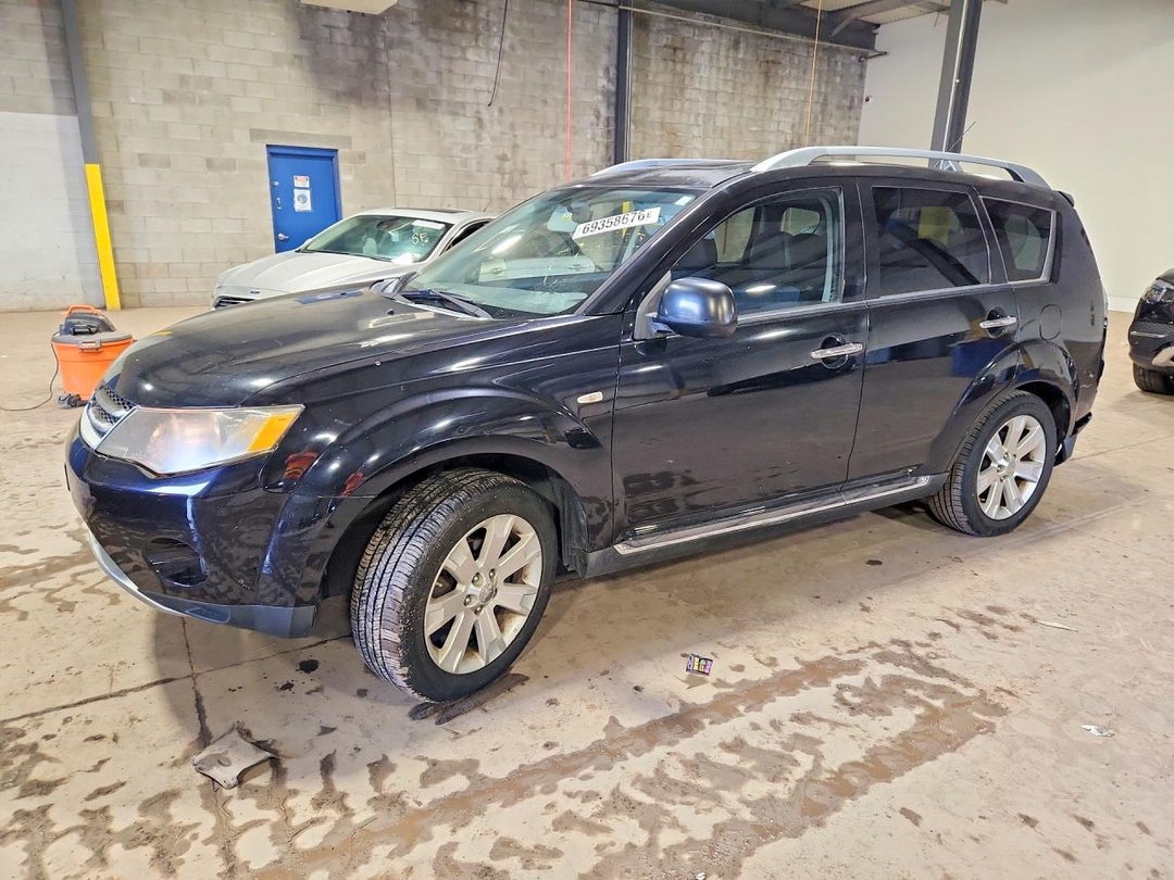 Вид 2009 MITSUBISHI OUTLANDER SE, угол 1