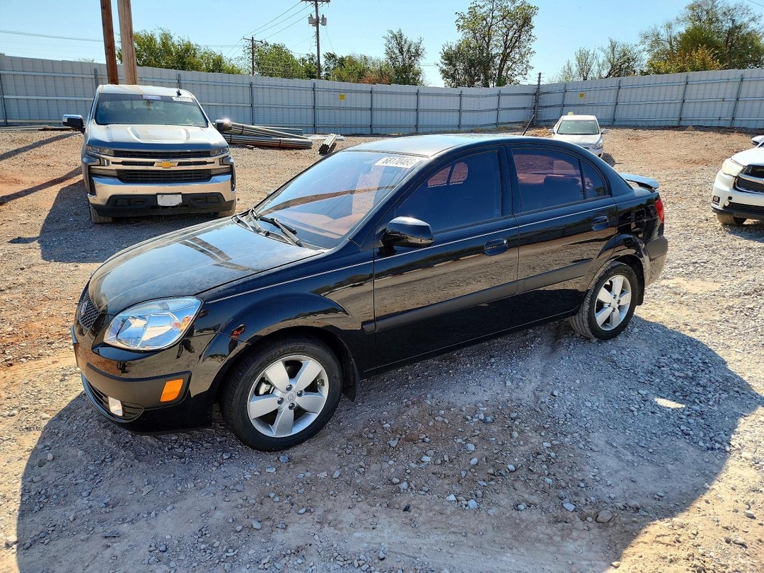 Вид 2009 KIA RIO BASE, угол 1