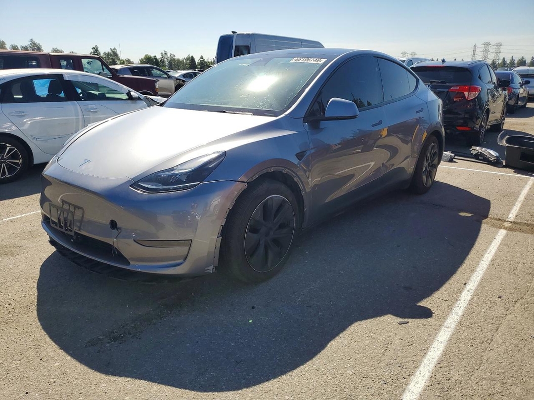 Вид 2025 TESLA MODEL Y, угол 1
