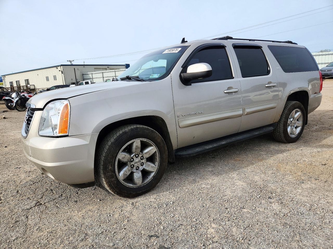 Вид 2009 GMC YUKON XL SLT, угол 1