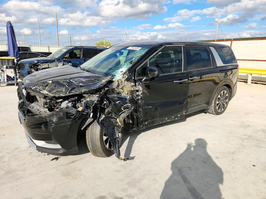 Вид 2024 KIA CARNIVAL EX, угол 1