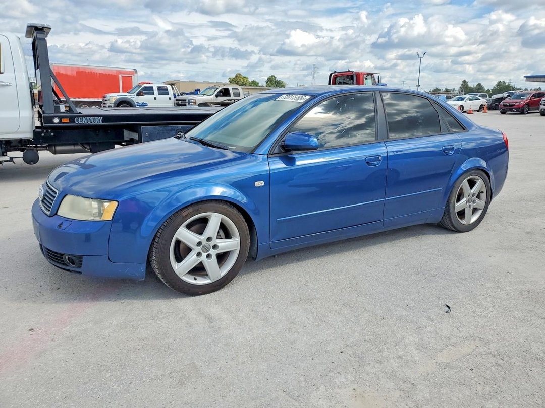 Вид 2004 AUDI A4 1.8T QUATTRO, угол 1