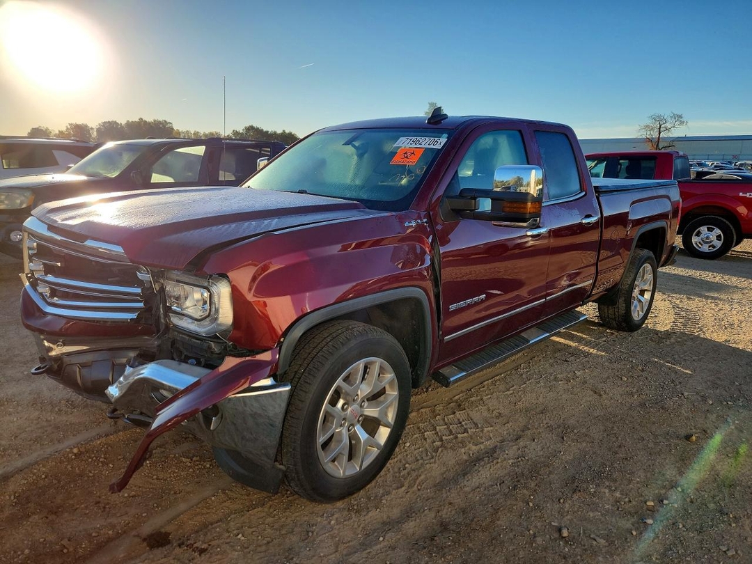 Vista de 2017 GMC SIERRA K1500 SLT, ángulo 1