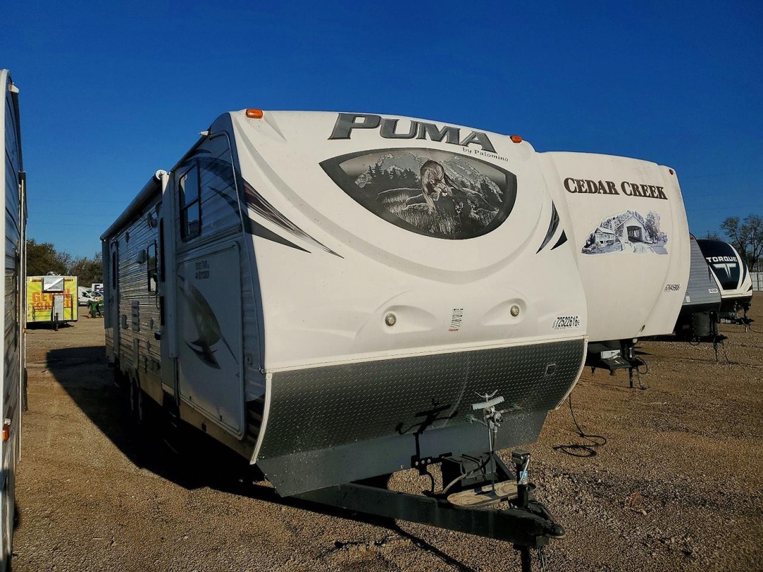منظر 2013 FOREST RIVER PUMA CAMPER، زاوية 1