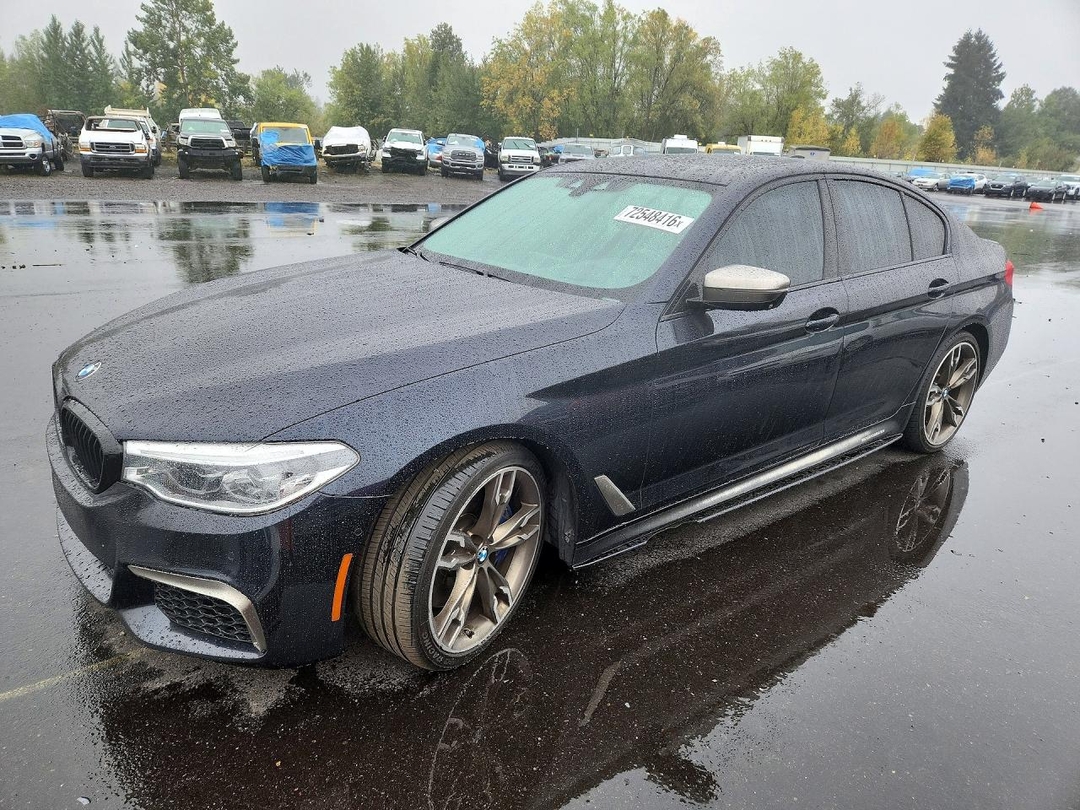 Вид 2019 BMW M550XI, угол 1