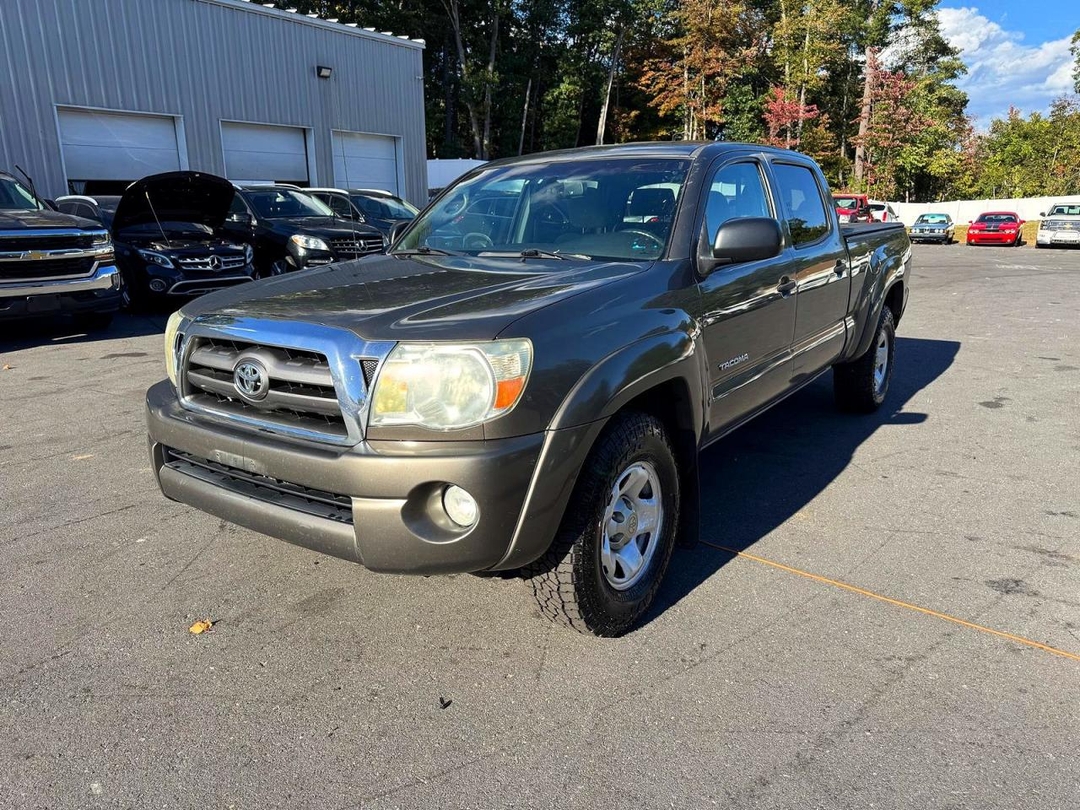 Vue de 2009 TOYOTA TACOMA DOUBLE CAB LONG BED, angle 1