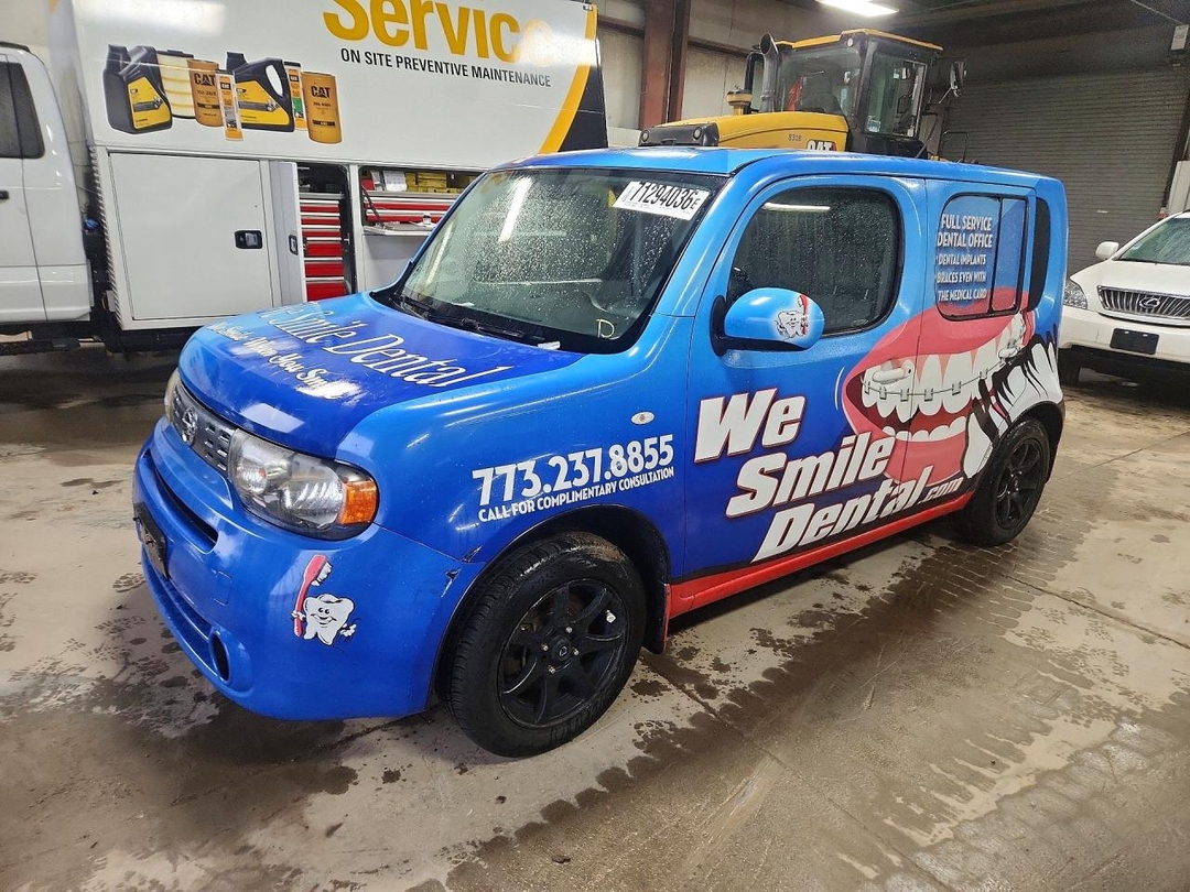 Вид 2011 NISSAN CUBE 1.8, угол 1