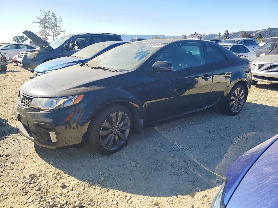 منظر 2012 KIA FORTE KOUP SX، زاوية 1