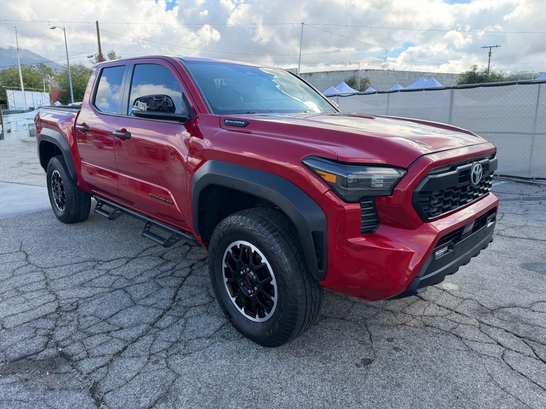 Vista de 2025 TOYOTA TACOMA TRD OFF-ROAD HV, ángulo 1