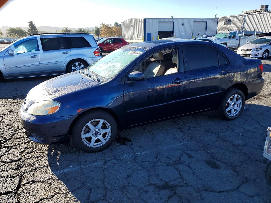 Вид 2003 TOYOTA COROLLA LE, угол 1