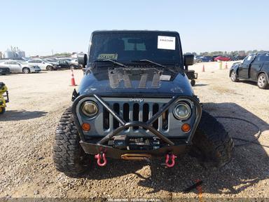 Вид 2012 Jeep Wrangler Unlimited Sport, угол 12