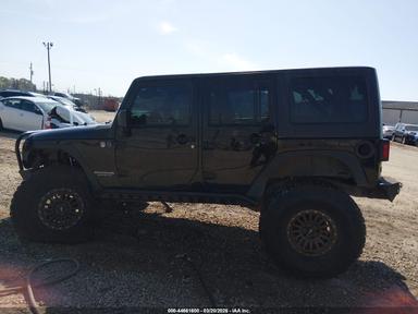 Вид 2012 Jeep Wrangler Unlimited Sport, угол 14