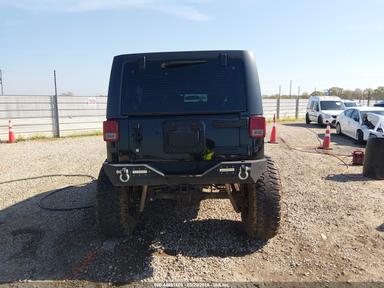 Вид 2012 Jeep Wrangler Unlimited Sport, угол 16