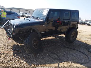 Вид 2012 Jeep Wrangler Unlimited Sport, угол 2
