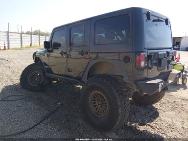 Вид 2012 Jeep Wrangler Unlimited Sport, угол 3
