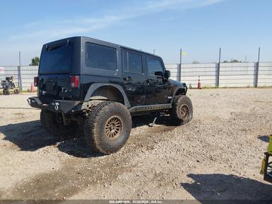 Вид 2012 Jeep Wrangler Unlimited Sport, угол 4