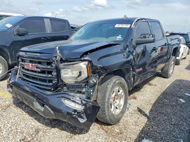 Vista de 2017 GMC SIERRA K1500 SLT, ángulo 1