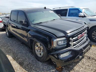 Vista de 2017 GMC SIERRA K1500 SLT, ángulo 4
