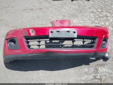 Vista de 2011 Nissan Versa 1.8S, ángulo 11