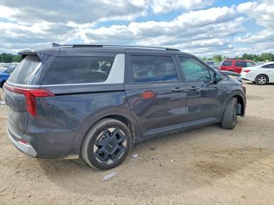 Vista de 2025 KIA CARNIVAL EX, ángulo 3