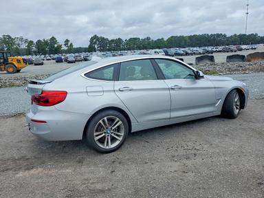 Вид 2019 BMW 330XI GT, угол 3