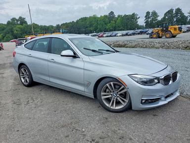 Вид 2019 BMW 330XI GT, угол 4