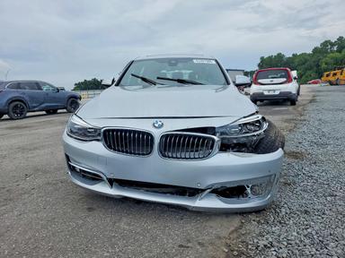 Вид 2019 BMW 330XI GT, угол 5