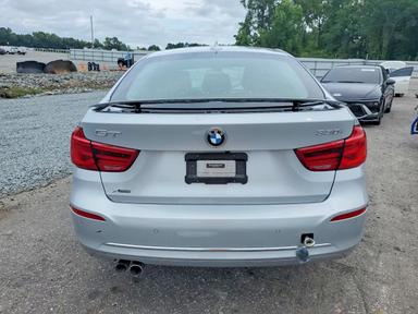 Вид 2019 BMW 330XI GT, угол 6