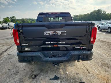 Vista de 2024 GMC SIERRA K1500 AT4X, ángulo 6