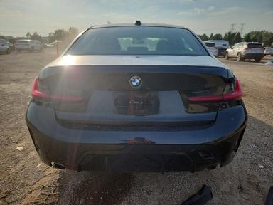 Vista de 2026 BMW 330XI, ángulo 6