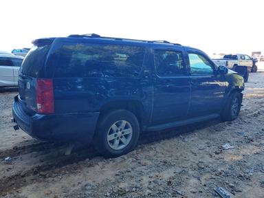 منظر 2007 GMC YUKON XL K1500، زاوية 3