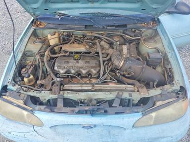 Вид 1999 FORD ESCORT SE, угол 11