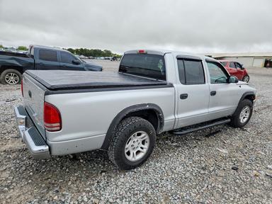 Вид 2004 DODGE DAKOTA QUAD SLT, угол 3