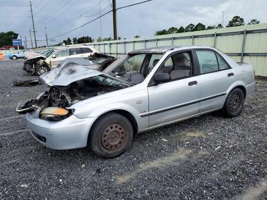 منظر 2003 MAZDA PROTEGE DX، زاوية 1