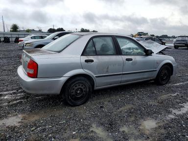 منظر 2003 MAZDA PROTEGE DX، زاوية 3
