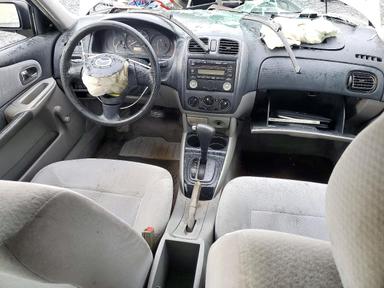 منظر 2003 MAZDA PROTEGE DX، زاوية 8